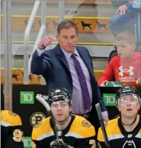  ?? STUART CAHILL / BOSTON HERALD FILE ?? Then-bruins head coach Bruce Cassidy makes a point to his team as the Bruins played the Florida Panthers at the Garden on April 26.