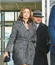  ?? JERRY JACKSON/BALTIMORE SUN ?? Former Baltimore City State’s Attorney Marilyn Mosby leaves federal court with her lawyer A. Scott Bolden following a motions hearing. Bolden has until Jan. 31 to explain, in writing, why Judge Lydia Kay Griggsby should not hold him in criminal contempt of court.