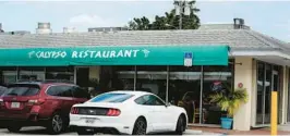  ?? CARLINE JEAN/SUN SENTINEL PHOTOS ?? Calypso Restaurant & Raw Bar in Pompano Beach has been a longtime Caribbean haven for fresh Bahamian conch, peppery jerk wings, peel-and-eat shrimp and cutters.