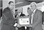  ??  ?? Group Chief Executive Officer Dr. Prasad Medawatta receiving the award at the CMA Excellence in integrated Annual Reporting Awards