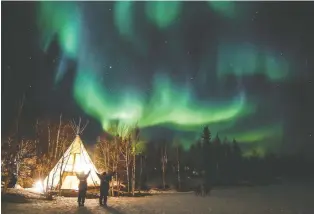  ?? JULIAN/AURORAVILL­AGE.COM ?? At Aurora Village, visitors can relax in a Teepee Village before heading out with a team of dogs. Aurora aims to share the Indigenous heritage, culture and traditions of the Northwest Territorie­s.