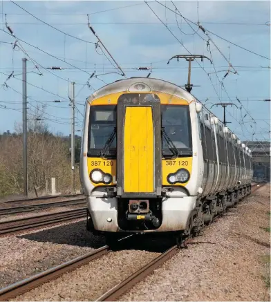  ?? NEIL PULLING. ?? Could Class 387 EMUs from London King’s Cross divide in future at both Cambridge and Kings Lynn, to enable a four-car set to run north to Hunstanton? Great Northern 387120 passes Biggleswad­e Holme Green on March 21 2017.