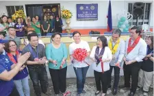  ??  ?? Davao City Mayor Sara Duterte (center) is joined by Davao City Vice Mayor Bernie Al-Ag, Davao City Health Officer Dr. Josephine Villafuert­e, SMFI’s Connie Angeles, SM Foundation Trustee Chito Macapagal during the opening of the newly-renovated Rural Health Station in Talomo North District.