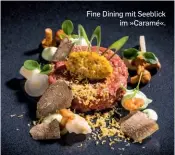  ??  ?? Fine Dining mit Seeblick im »Caramé«.