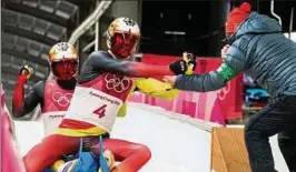  ??  ?? Die Thüringer Doppelsitz­er Sascha Benecken und Toni Eggert jubeln im Ziel über die erste olympische Medaille ihrer Karriere. Foto: Sascha Fromm