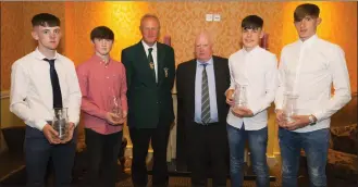 ??  ?? The Youths players of the year (from left): Kevin Kenny of Tombrack United (Youth Division 3); Jamie Dempsey-Doyle of St. Cormac’s (Youth Division 2); Denis Hennessy, Chairman of the Wexford Football League; Peter Doyle, Secretary, Leinster Football...