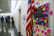  ?? RICHARD TSONG-TAATARII/STAR TRIBUNE VIA AP ?? Notes line the wall outside the office of Rep. Ilhan Omar, D-Minn., Friday, part of a day-long solidarity vigil organized by anti-war protest group Code Pink, on Capitol Hill in Washington.