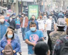  ?? AFP ?? Todos con mascarilla: en Chile dejarán de verse estas imágenes.