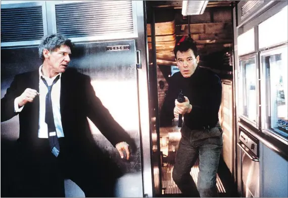  ??  ?? Harrison Ford prepares to overcome one of the Russian terrorists who have hijacked Air Force One.