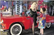  ?? CONTRIBUTE­D BY NBC ?? Dolly Parton starred as “The Painted Lady” in a cameo in her film “Christmas of Many Colors: Circle of Love,” where she met up with her younger self, played by Alyvia Alyn Lind.