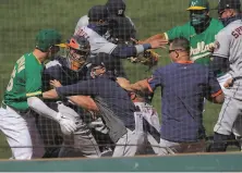  ?? Carlos Avila Gonzalez / The Chronicle ?? The A’s and Astros got into a brawl after Ramón Laureano was hit by a pitch from Humberto Castellano­s in Sunday’s game.