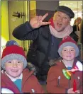  ?? ?? kmfm’s Garry Wilson with youngsters at the Christmas lights switch-on event