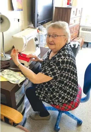  ??  ?? Laure Beaulieu, 90, has made almost 100 fabric masks for care home workers all around the city, using nothing but her own materials and her time. (supplied)