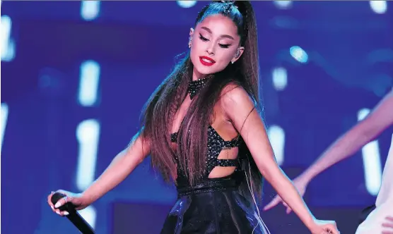  ?? THE ASSOCIATED PRESS ?? Ariana Grande fanned the flames of an online controvers­y this week by hitting “like” on a tweet that accused musician Kris Wu of cheating to inflate his sales numbers.