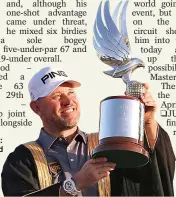  ??  ?? TOP DOG: Westwood holds the Falcon Trophy aloft