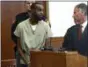  ?? ASSOCIATED PRESS FILE ?? Abdirahman Sheik Mohamud, front left, speaks with his attorney Sam Shamansky, right, during a hearing to set bond in Columbus in 2015.