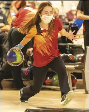  ?? Staff photo/ David Pence ?? New Bremen’s Emma Keller bowls during a Midwest Athletic Conference girls bowling match at Speedway Lanes in New Bremen.