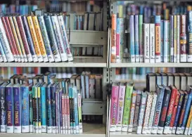  ?? ?? Books in the children's section of the Library Center on South Campbell Avenue on June 5.