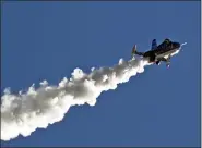  ?? PAT SUTPHIN — THE TIMES-NEWS VIA AP, FILE ?? Stuntman Eddie Braun flies the “Evel Spirit” rocket over the Snake River Canyon in Twin Falls, Idaho.