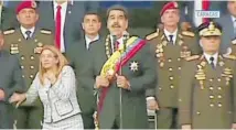  ?? Photo / AP ?? First lady Cilia Flores is startled by an explosion as President Nicola´ s Maduro speaks.