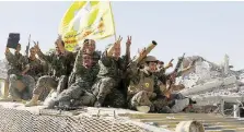  ?? Reuters ?? Combattent­i Reparti delle Syrian Democratic Forces a Raqqa