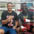  ??  ?? Junior Fa, left, has been a regular sparring partner with former WBC champ Deontay Wilder.