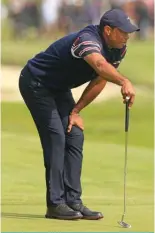  ?? AFP ?? CALIFORNIA: Tiger Woods of the United States reacts to his putt on the second green during the second round of The Genesis Invitation­al at Riviera Country Club on February 16, 2024.—