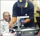  ??  ?? President Mugabe is taken through the inaugural biometric voter registrati­on (BVR) process by Zimbabwe Electoral Commission computer technician Mr Noel Shumba at State House in Harare yesterday, marking the commenceme­nt of voter registrati­on ahead of...