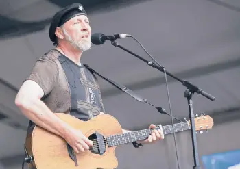  ?? DAVE MARTIN/AP ?? Richard Thompson at the 2008 New Orleans Jazz & Heritage Festival at the New Orleans Fairground­s Racetrack. Thompson cowrote “Beeswing” with Scott Timberg.