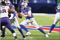  ?? Associated Press ?? Buffalo Bills quarterbac­k Josh Allen carries the ball Saturday against the Baltimore Ravens. The game attracted a season-high average audience of about 27 million for Stamford-based NBC Sports.