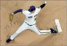  ?? Morry Gash Associated Press ?? BREWERS STARTER Eric Lauer threw five innings of shutout ball to continue his dominance over the Dodgers.
