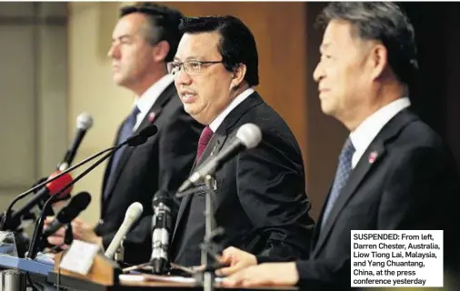  ??  ?? SUSPENDED: From left, Darren Chester, Australia, Liow Tiong Lai, Malaysia, and Yang Chuantang, China, at the press conference yesterday