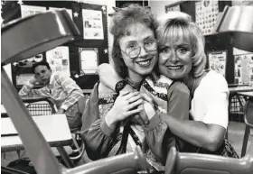  ?? Erich Schlegel / TNS 1994 ?? Irving MacArthur High School senior Amber Tatro, 18, with Marilyn Qualls, her Special Education teacher for four years, in a May 1994 file image.