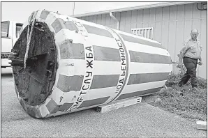 ?? Tribune News Service/Sun Sentinel/CARLINE JEAN ?? The Soviet-era buoy that drifted ashore at Dania Beach, Fla., after Hurricane Irma sits in a parking lot at Dr. Von D. Mizell-Eula Johnson State Park.