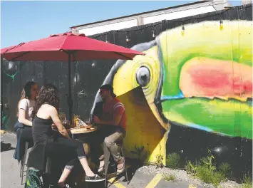 ??  ?? Andina Brewery in East Vancouver has opened a patio for service during the pandemic.