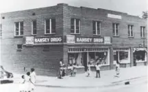  ??  ?? Ramsey Drug Store was one of the businesses in the economic and cultural mecca in north Tulsa. Greenwood Cultural Center
