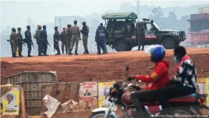  ??  ?? Ugandan police patrol Kampala. The elections have been marked by heavy military and police deployment