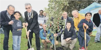  ??  ?? The tree planting ceremony at Central Park