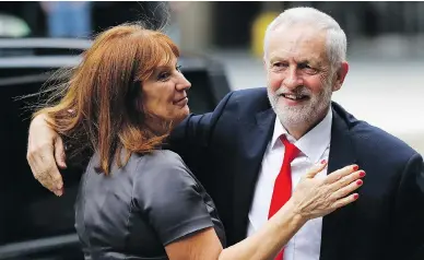  ?? FRANK AUGSTEIN/THE ASSOCIATED PRESS ?? Britain’s Labour party leader Jeremy Corbyn, who won 262 seats in the U.K. election — up from 229 — is greeted as he arrives at Labour Party headquarte­rs in London Friday. His leftist battle cry resonated with young voters.