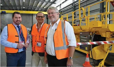  ?? Photo: Contribute­d ?? MILESTONE: Celebratin­g Russell Mineral Equipment’s success are (from left) Shadow Minister for Manufactur­ing Andrew Powell, Toowoomba South MP David Janetzki, and Russell Mineral Equipment executive chairman Dr John Russell.