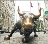  ?? Mary Altaffer / Associated Press file photo ?? The charging bull in lower Manhattan in New York.