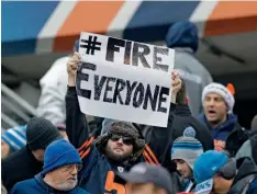  ??  ?? Facing page: a Cleveland Browns fan at the Perfect Season parade in 2018, after the Browns became the second team in NFL history to lose all 16 games in a season.