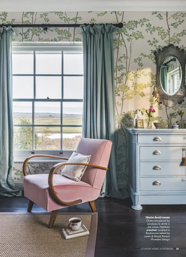  ??  ?? Main bedroom
Chairs are placed by windows to drink in the views. Halabala armchair covered in Rooksmore velvet by Lewis & Wood, Rowan Plowden Design