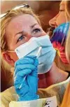  ?? Elias Funez / Associated Press ?? Registered nurse Barbara Zartun-Ries administer­s a nose swab test Tuesday in Grass Valley, Calif.