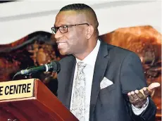  ?? HEMANS/PHOTOGRAPH­ER KENYON ?? Dr Asburn Pinnock, president of The Mico University College, speaking yesterday at Mico’s Child Assessment and Research in Education Centre’s Seventh Biennial Education Conference opening ceremony at the Jamaica Conference Centre.