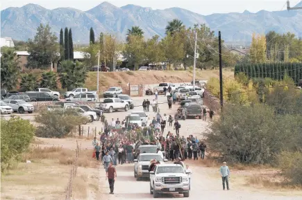  ?? Photo / AP ?? Victims of Tuesday’s shooting were laid to rest yesterday in La Mora, Mexico. Mexican soldiers accompanie­d the procession.