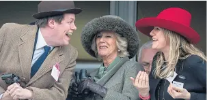  ??  ?? Enjoying a day at Cheltenham races with her son Tom and daughter Laura