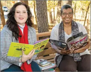  ?? (Arkansas Democrat-Gazette/Cary Jenkins) ?? Siobhan Carpenter and Nancy Robinson are volunteers with AR Kids Read. Robinson, who has volunteere­d in schools for about 20 years, currently is working with two fifth-graders. Carpenter, who has experience providing private speech therapy at schools across the nation, says tutoring allows her to exercise her profession­al skills.