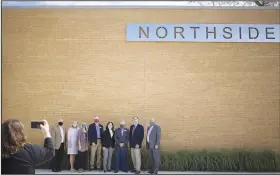  ?? (NWA Democrat-Gazette/Charlie Kaijo) ?? Rogers school board members take a photograph Friday with U.S. Sen. John Boozman, R-Ark., at Northside Elementary School in Rogers. Check out nwaonline.com/200808Dail­y/ for today’s photo gallery.