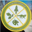 ?? MARK MCNEIL PHOTO ?? The crest of the Colin Macdonald Community School that is on the entrance door to the school on Paradise Road North in Hamilton.